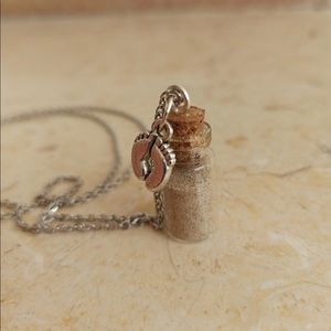 Footprints in the sand necklace